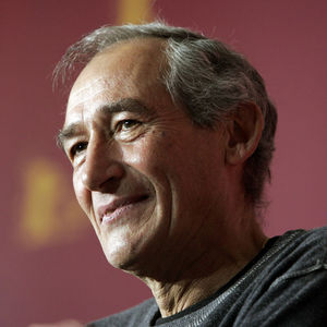 French director Alain Corneau during a photo call prior to a news conference about his movie 'Les mots Bleus - Words In Blue' in Berlin on Wednesday, Feb. 16, 2005.
