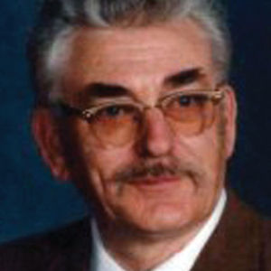 THEODORE WILLIAM KUHNS