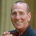 A Wednesday, June 9, 2004 photo from files showing British actor Peter Postlethwaite displaying his Order of the British Empire or OBE, shortly after the presentation at Buckingham Palace in London. Britain's Press Association is reporting Monday, Jan. 3, 2011 that decorated film actor Pete Postleth