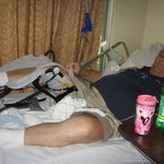 RC in hospital, for knee replacement "trying to crack a smile"