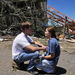 Sarah King, right, comforts fiance Brett Crump as they survey the damage to their apartment in the Alberta City neighborhood Thursday April 28, 2011, after a tornado struck Tuscaloosa, Ala. the day before.