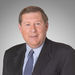 This undated photo provided by CNBC, shows Mark Haines, co-anchor of CNBC's morning "Squawk on the Street." Haines died at his home unexpectedly on Tuesday evening, May 24, 2011, the network said. He was 65.