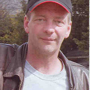 Gregory J. MENHENNICK