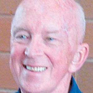 THOMAS MICHAEL "TOM" FLYNN