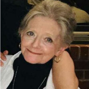 Joi E. Tatick