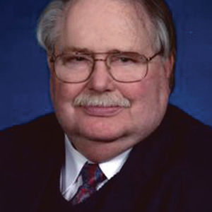 JAMES E. "JIM" SMITH