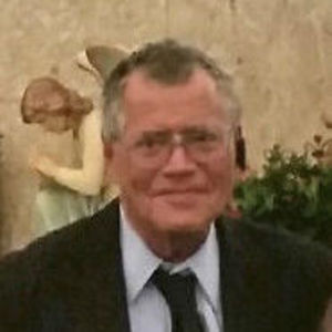 JOHN A. LOUDEN